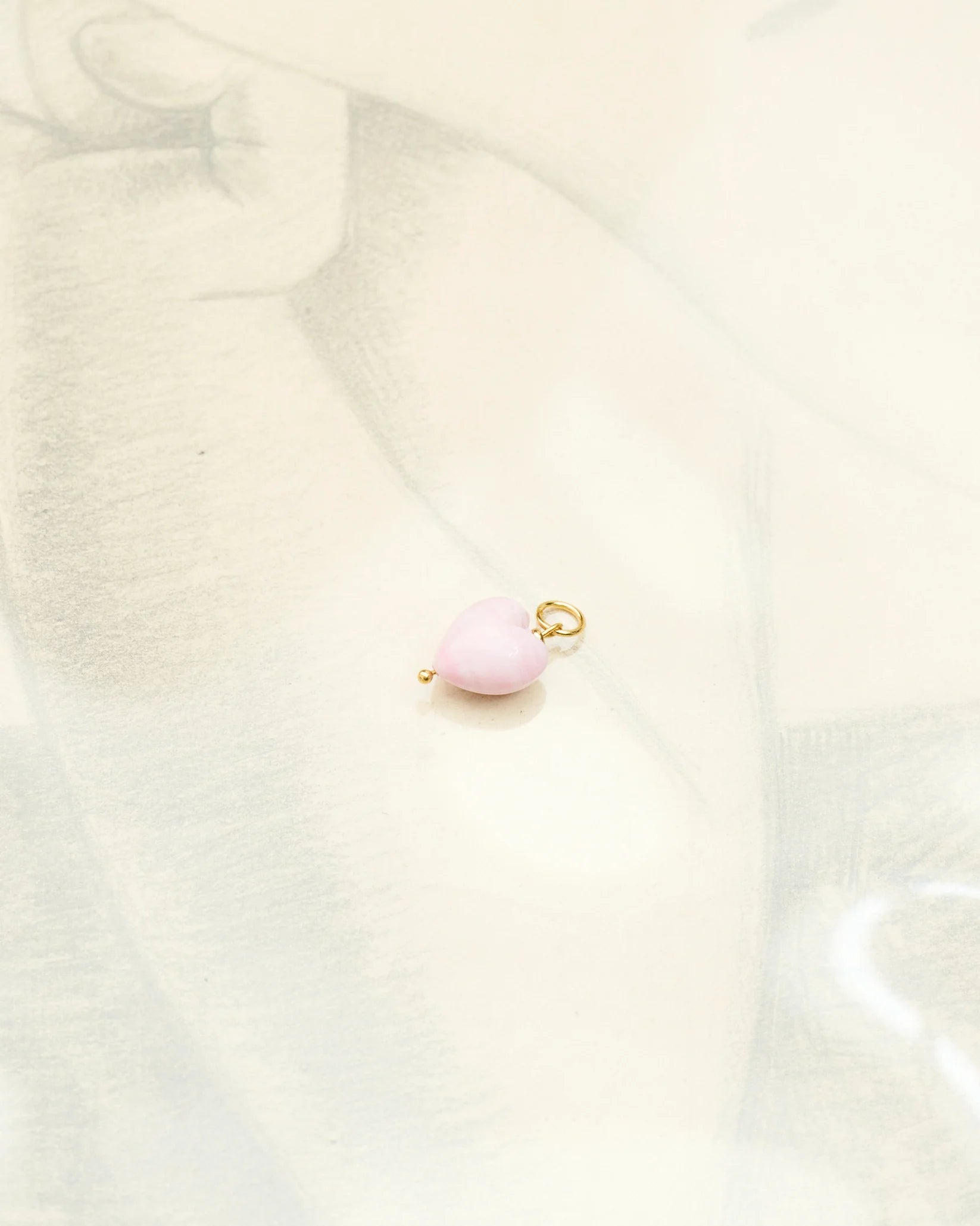 Lyserødt hjerteformet vedhæng af muranoglas