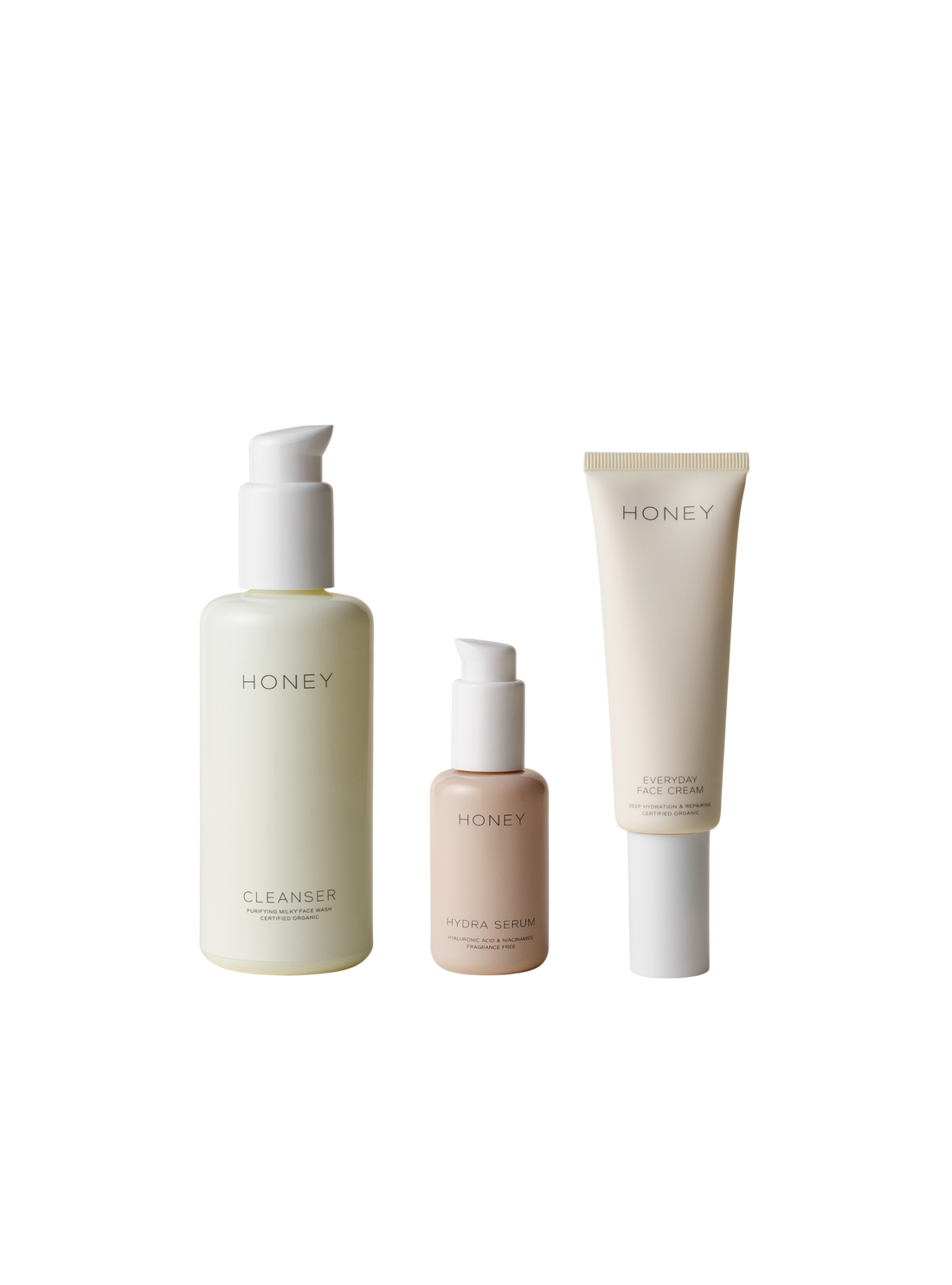 Tre flasker Honey hudpleje - rensemiddel - ansigtsvask, hydraserum og hverdags ansigtscreme