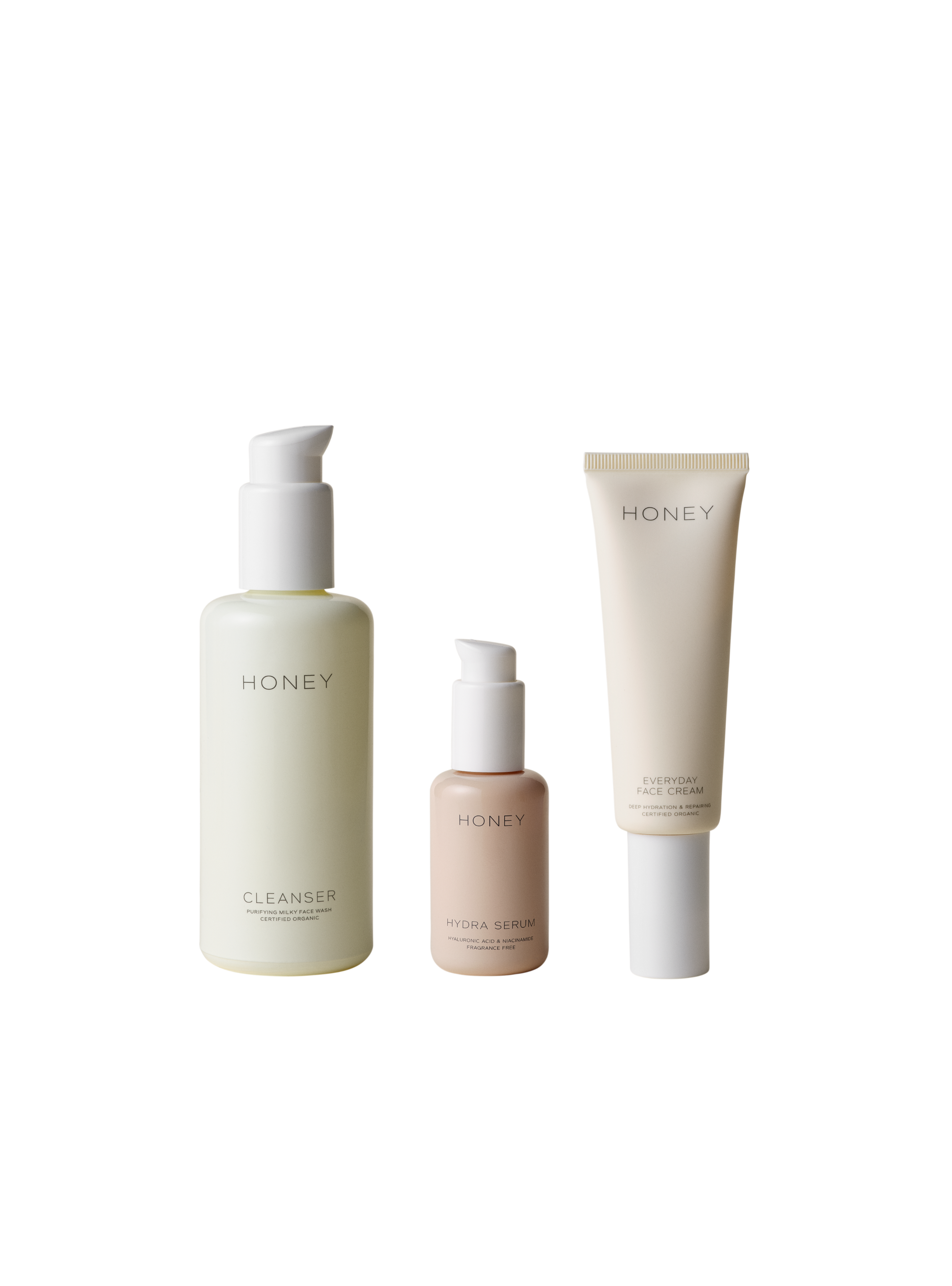Tre flasker Honey hudpleje - rensemiddel - ansigtsvask, hydraserum og hverdags ansigtscreme