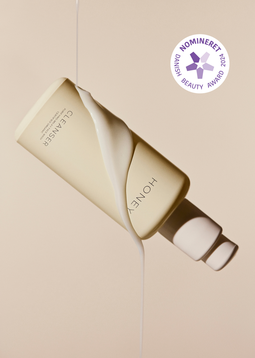Naturlig ren cleanser - ansigtsvask i lys gul flaske med hvid låg - clean skincare